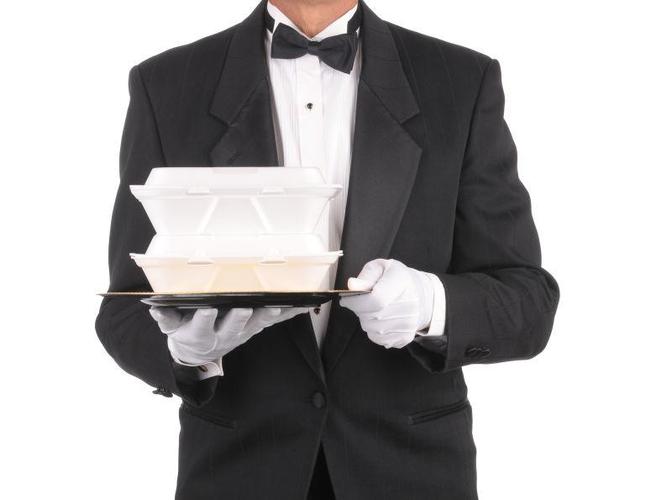 服务员端着托盘上的食物容器图片素材
